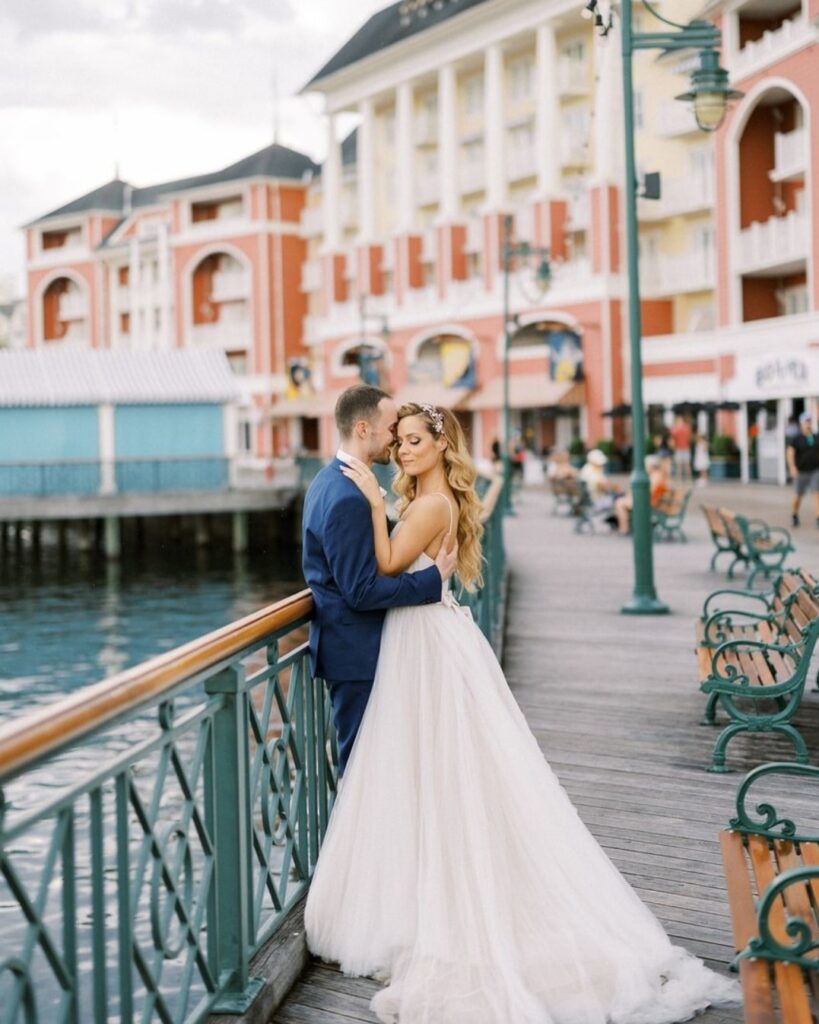 Soft romantic photo of a newly married couple at Boardwalk Resort in Disney World